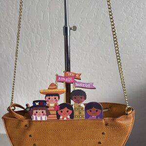 Danielle Nicole x Disney "it's a small world" boat-shaped crossbody bag